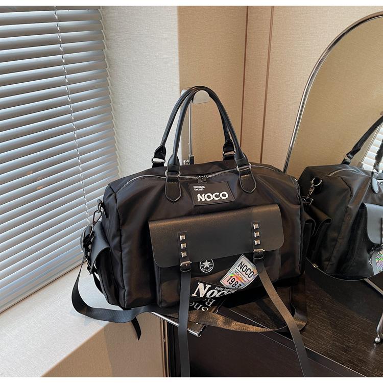 

Canvas bag women s large-capacity new messenger luggage bag leisure sports fitness bag short-distance travel bag чорний
