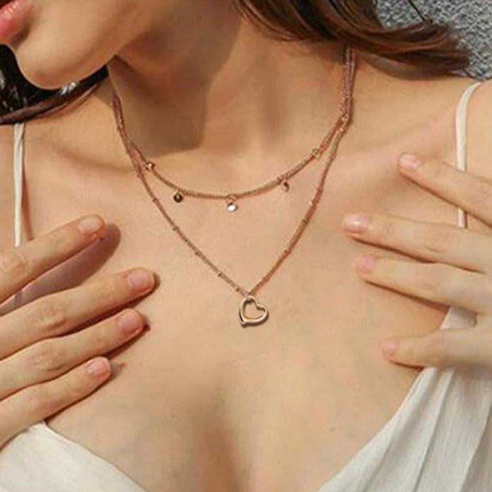 

Stainless Steel Heart Pendant Tassel Necklace with Double-Layer Beaded Chain