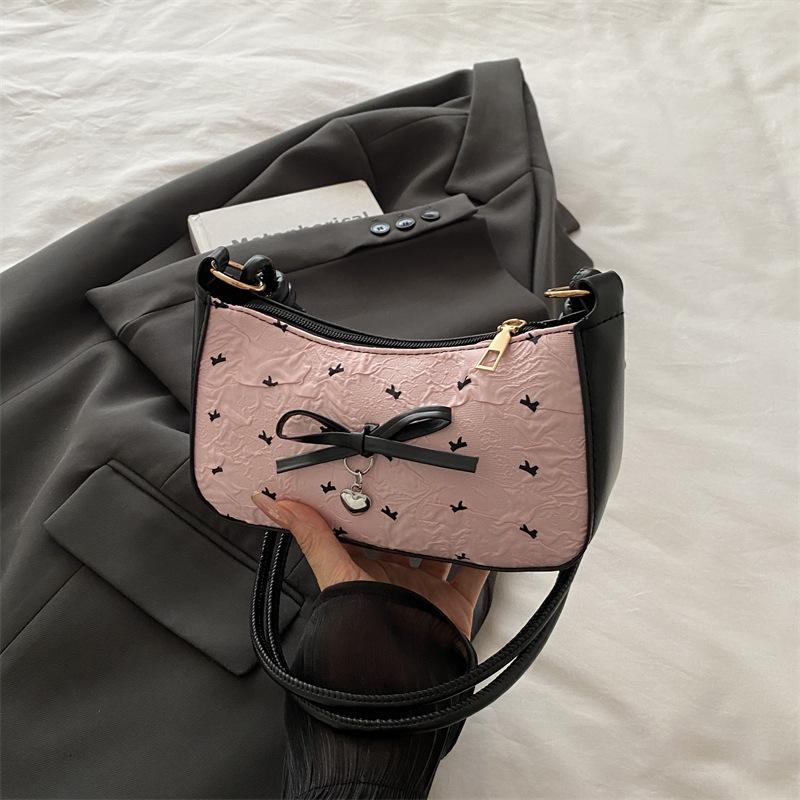 

Нишевый дизайн сумка-багет с бантом под мышкой женская 2025 новая модная сумка на плечо через плечо сладкая сумка-багет розовый