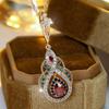 Elegante collana con ciondolo in cristallo color oro per donna, vintage, a forma di goccia d'acqua, gioiello da festa vuoto