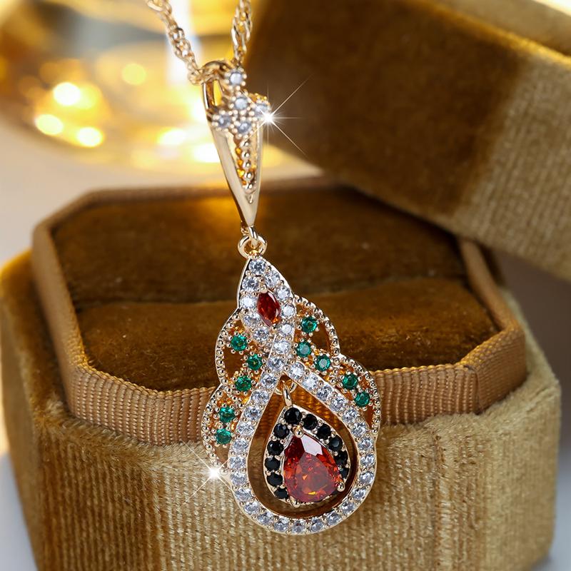 Elegante collana con ciondolo in cristallo color oro per donna, vintage, a forma di goccia d'acqua, gioiello da festa vuoto