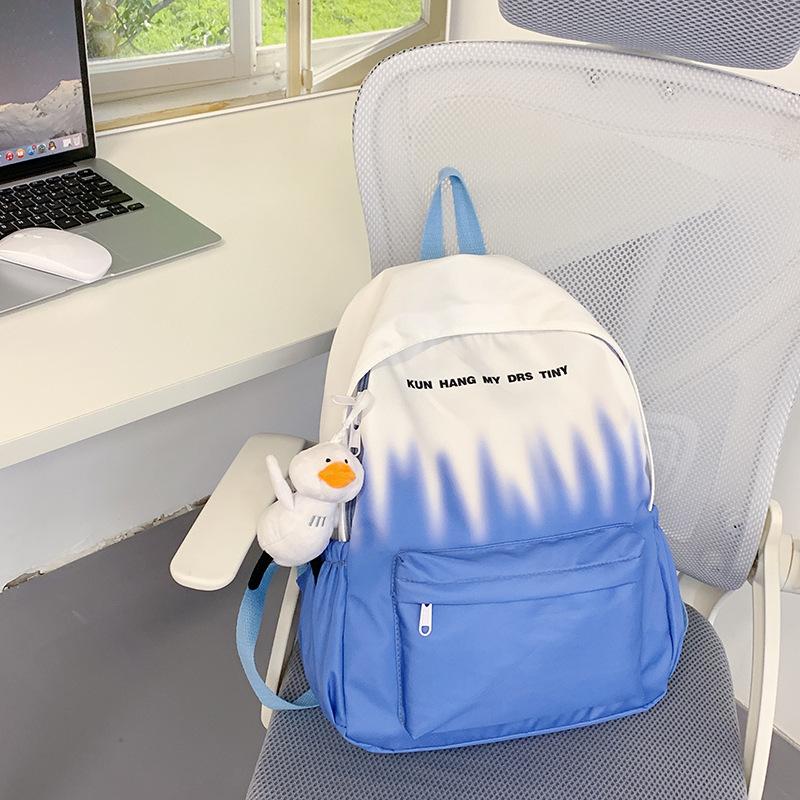 Graffiti Gradient Personality Schoolbag College Students' Backpacks for Boys and Girls' Travel Schoolbags Are Light and Large Capacity Backpacks.