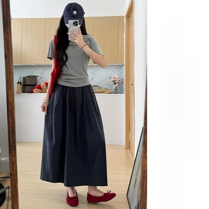 College Style Women A Line Skirt With Nylon Fabric And Tie Detail For Casual Wear