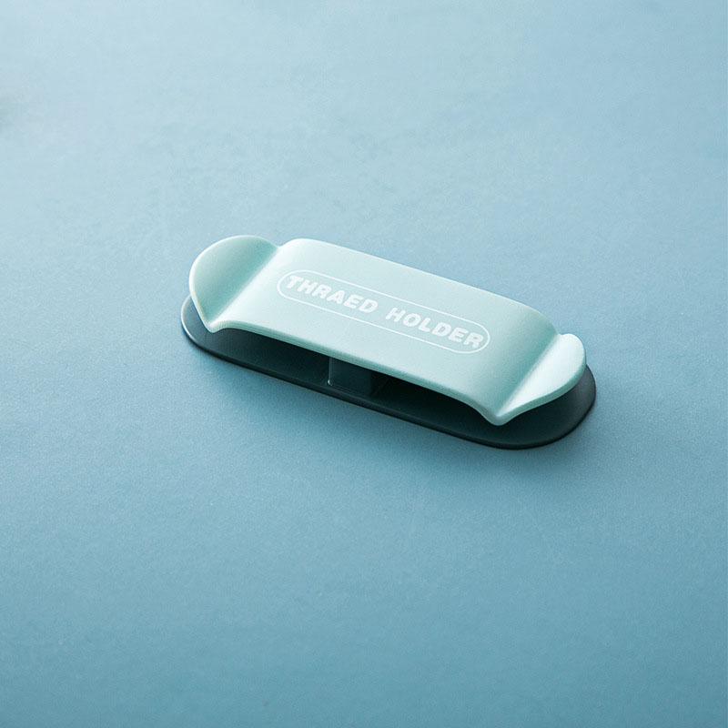 

Тримач розетки для вилки Настінний самоклеючий гачок Багатофункціональний настінний гачок Намотувач USB-кабелю для передачі даних Приймач для навушників світло-синій колір