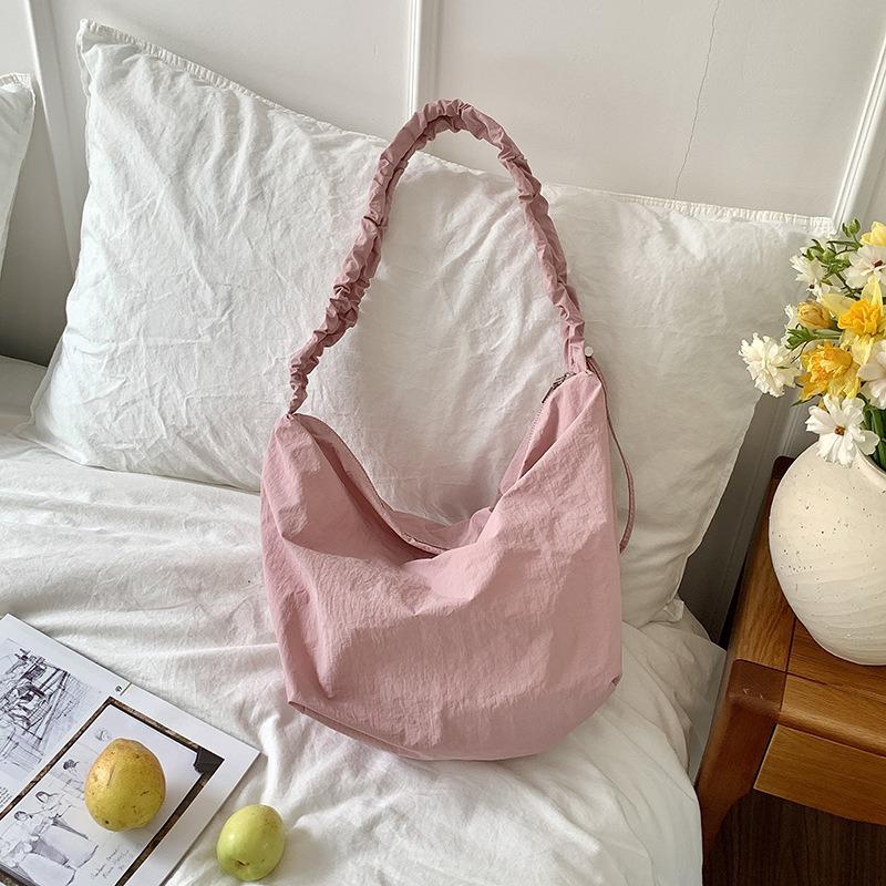 Shoulder bag women's senior sense spring and summer versatile commuter dumpling bag nylon drawstring pleated casual messenger bag women