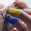 5 szt./partia Kciuk Gitary Chroń Rozdarte Palce lub Linię Poprzez Naciskanie Elastyczny Silikon Ukulele Palec