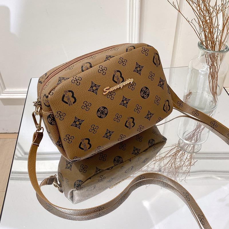 Blumenmaterial kleine quadratische Tasche, Tasche für Frauen, eine Umhängetasche mit Kette.