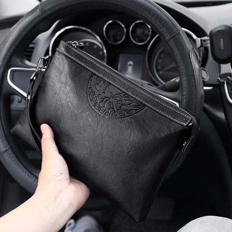 Men's Cross-Border Fashion Zipper Clutch: Large Capacity, Textured Handbag for Business & Portability.