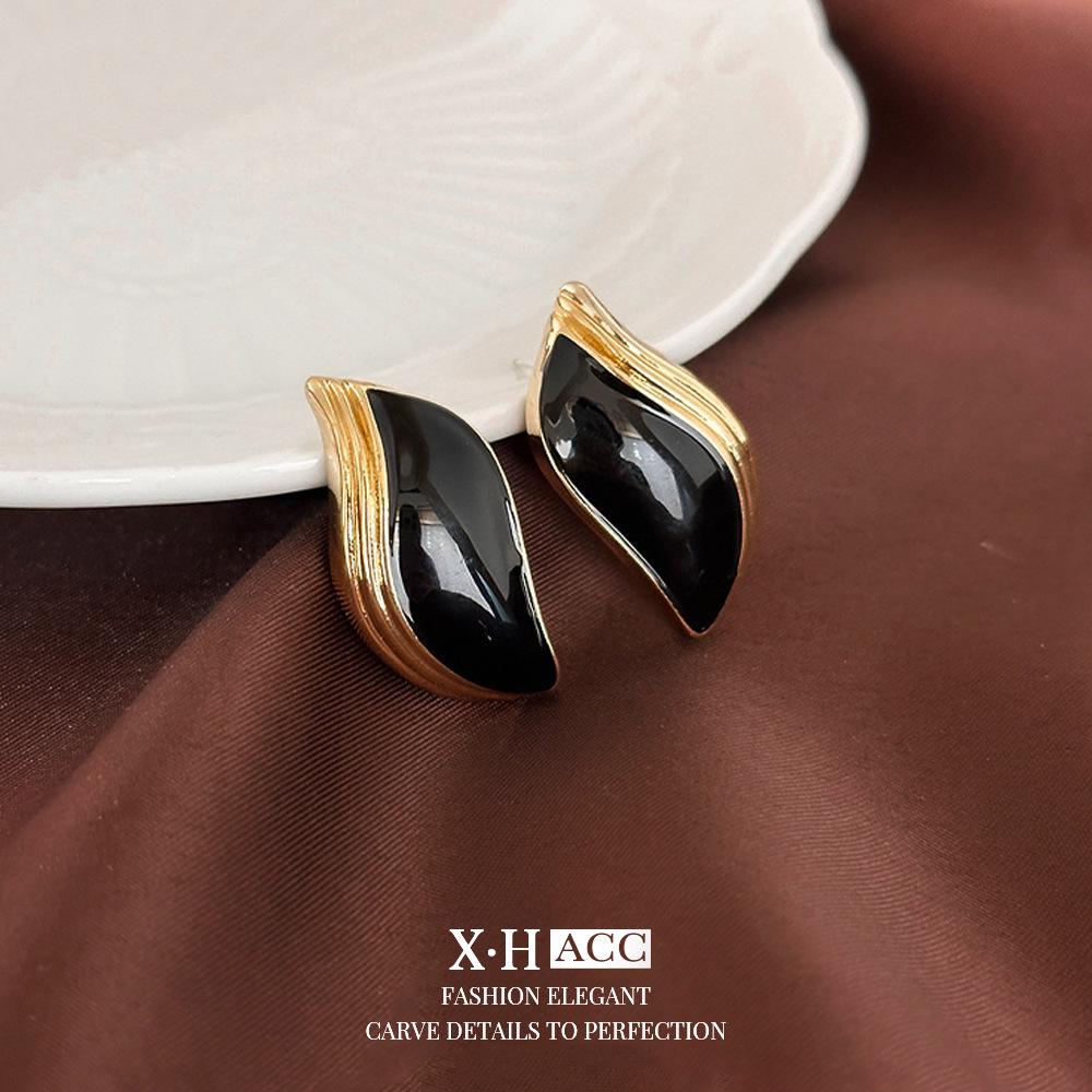 Elegant Gold-Plated Black Zircon Stud Earrings - Niche Design for a Luxurious Fashion Statement
