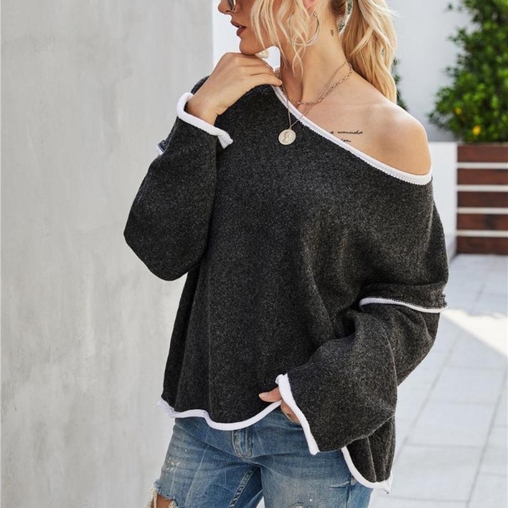 Женский вязаный свитер с круглым вырезом и кисточкой на спине — фото 15