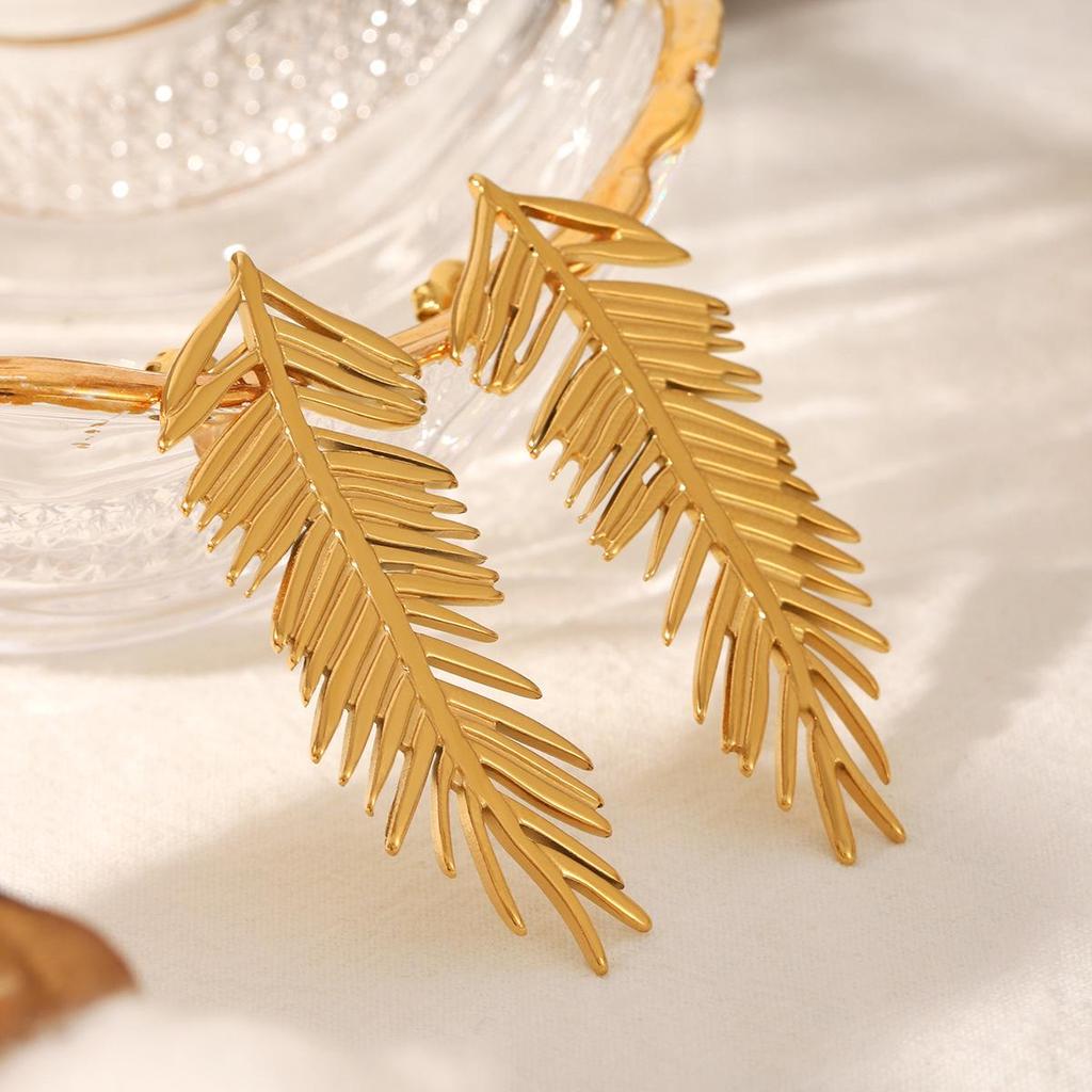 European & American Leaf Feather Stainless Steel Long Dangle Earrings - Stylish, Versatile, Light Luxury Jewelry for Women.