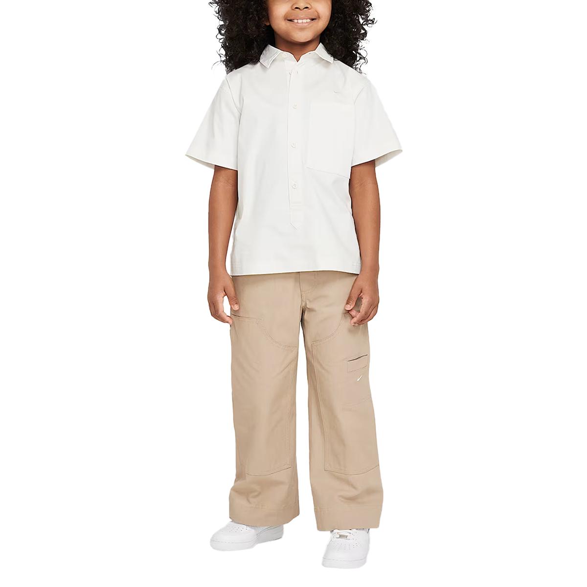 

Nike Sportswear Metro Ground Solid Loose Fit Collared Short Sleeve Shirt Kids Tops Phantom-Grey White HF8054-030 M