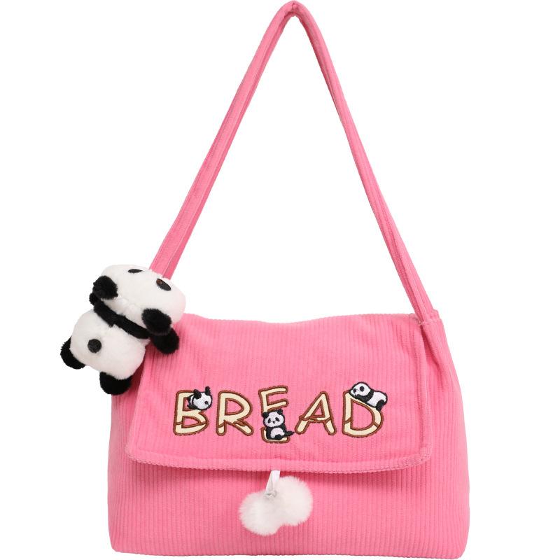 

Guangzhou luggage Korean corduroy handbag women s ins canvas bag retro shoulder bag fashion commuter armpit bag