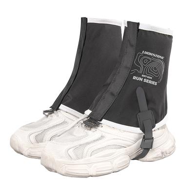 Wasserdichte Gamaschen zum Wandern und Trailrunning. Schwarze, elastische Schuhgamaschen mit DWR-verstellbaren Riemen.