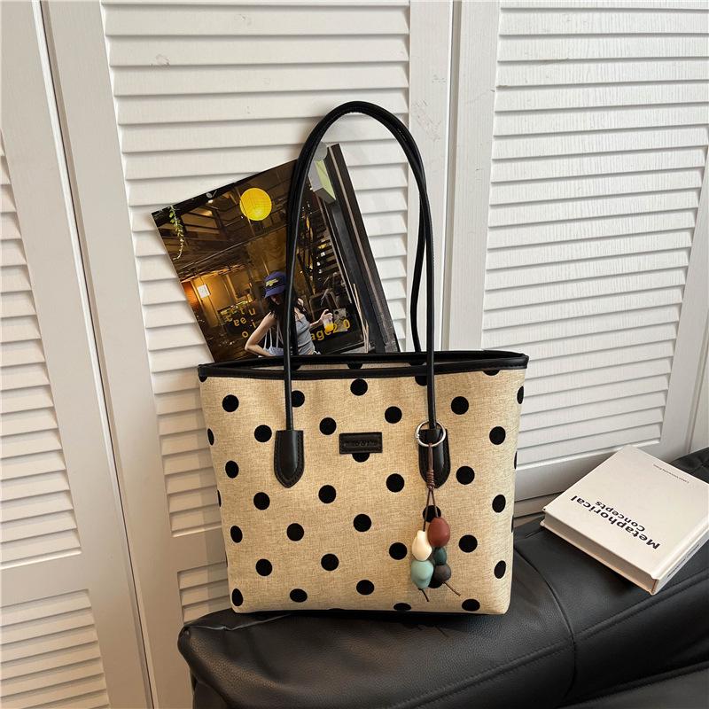 Stylish Polka Dot Large Capacity Tote: Versatile, Fashionable Handheld & Shoulder Bag for Commuting.
