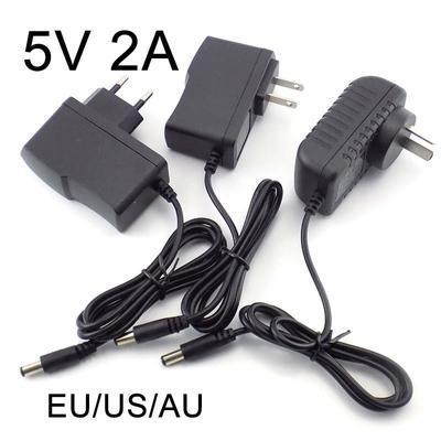 DC 5V 2A Netzteil Versorgung AC zu DC 100 V-240V Konverter Ladegerät 2000mAh 5,5mm x 2,1mm US EU Stecker für LED Streifen CCTV Kamera E1