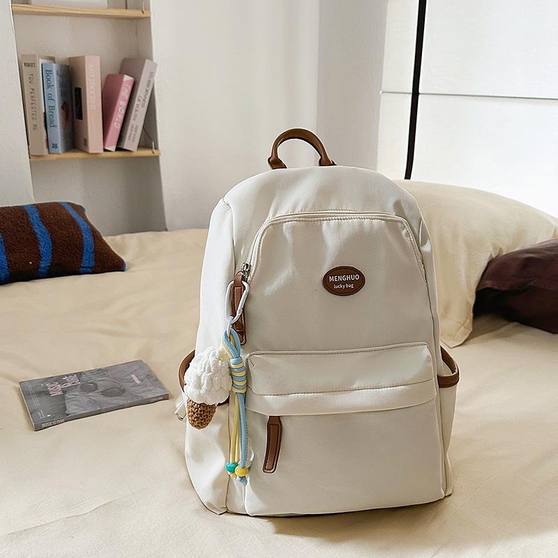 Backpack women 2025 new fashion and leisure junior high school students travel backpack simple versatile college bag tide