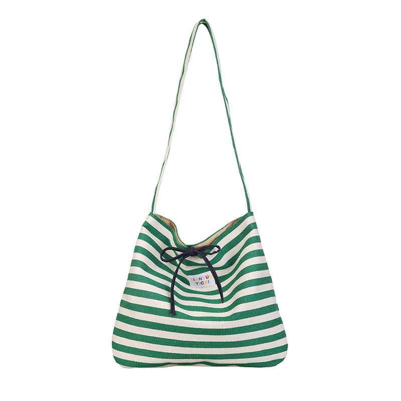 Casual striped canvas bag women's spring and summer new largecapacity commuter shoulder messenger bag