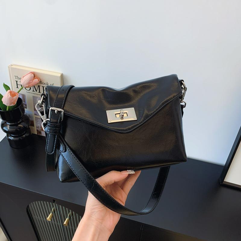 

Премиальные фактурные маленькие сумки, женские сумки 2024 года, новые модели популярны в этом году, женские нишевые сумки-мессенджеры - это универсальные и популярные маленькие сумки. чёрный