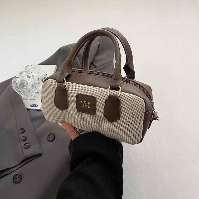 Nischen-Kontrastfarben-Bowlingtasche Damen Neu Hochwertige Canvas-Handtasche Retro Schulter-Umhängetasche