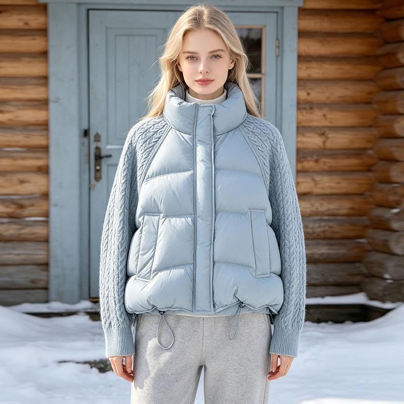 European and American knitted sleeves splicing down jackets women's short winter fashion stand-up collar warm white duck down tops are popular