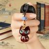 Ebony Cat Keyring Pendant: Creative Wooden Bag Charm for Men and Women.