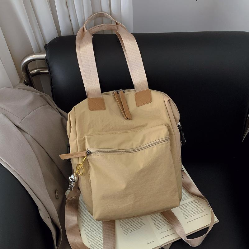 Schoolbag large capacity handbag bag 1011 new niche fashion backpack female college student shoulder bag lightweight backpack tide