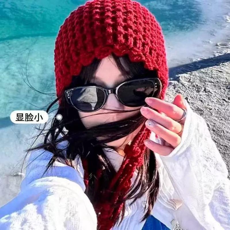 Autumn and winter hand-woven hollowed-out bald hat Warm wool hat Women's fringed ear protector Knitted hat