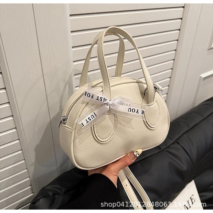

Niche design solid color messenger bag fashionable versatile bowling handbag 2025 texture simple shoulder bag