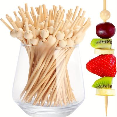 Lot de 100 pics à cocktail en bois naturel de 11,9 cm, parfaits pour les boissons, les apéritifs et les collations de fête. Parfaits pour les fruits, les légumes et la charcuterie.
