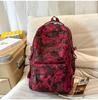 Schoolbag schoolbag female burden reduction large-capacity backpack male can hang tie rod college student travel commuter backpack tie-dye bag