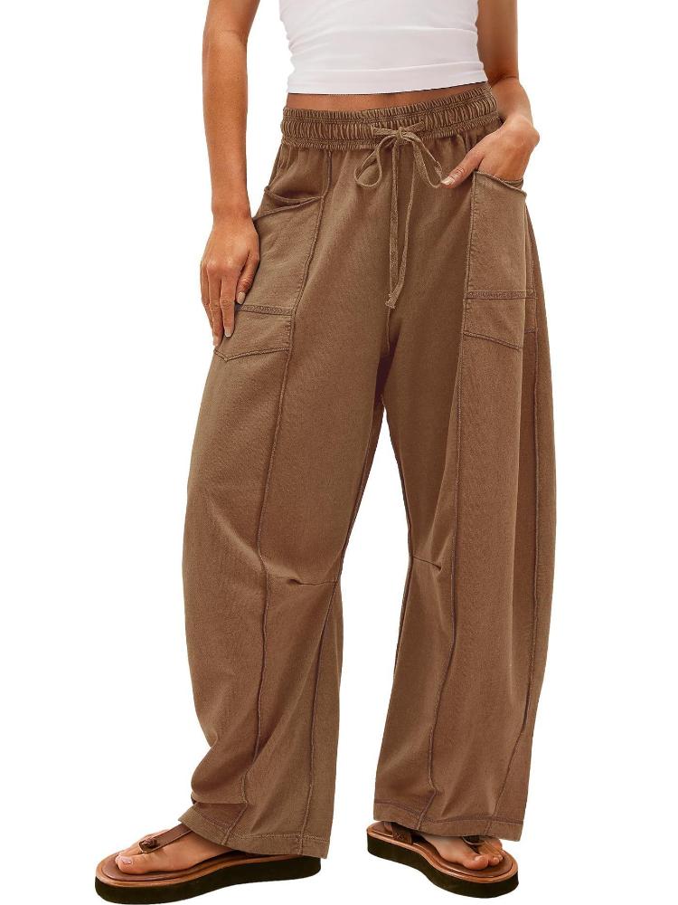 Dámské béžové kalhoty se širokými nohavicemi se stahovací šňůrkou v pase a bočními kapsami