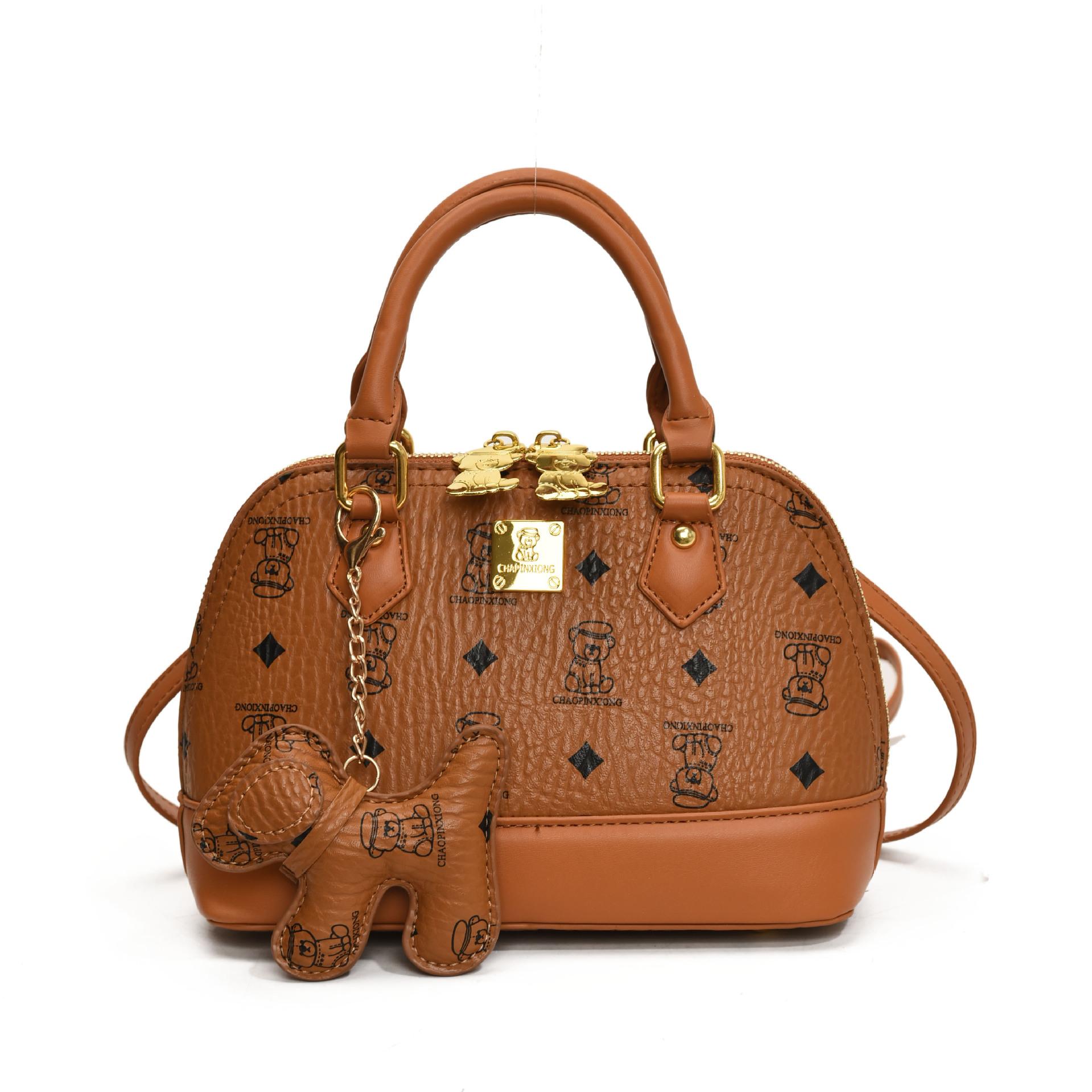 

Темпераментная сумочка маленькая сумка сумка-мессенджер высококлассная сумка-ракушка женская новая с принтом медведя нишевая мода коричневый