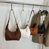 Simple retro shoulder bag women's new fashionable texture underarm bag casual commuter dumpling bag