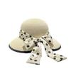 Fairy wind polka dot bow straw hat female summer outing straw weaving sunscreen visor sweet beach fisherman basin hat