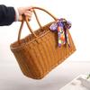 Rattan Picknicktasche - Handgeflochtener Korb zum Einkaufen und Aufbewahren im ländlichen Stil.