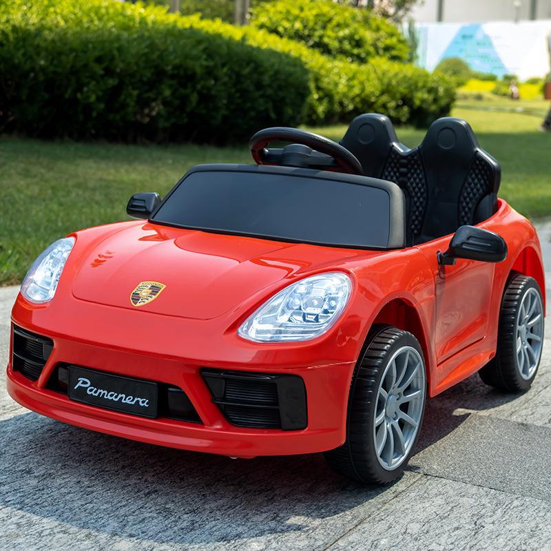 

Детский электромобиль с дистанционным управлением, фарами, музыкой и режимом коляски для мальчиков и девочек.