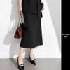 Elegant Coffee-Colored Collarless Skirt Suit for Women with Waist-Cinching Belt - Perfect for Urban Professional Style and Commuting.