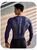 Men's Seamless Fitness Compression Top: Long Sleeve, Quick Dry, Elastic for Muscle Definition.