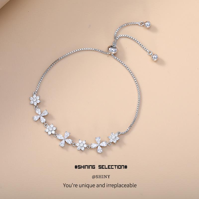 Elegante Braccialetto con Coulisse in Zirconi Europei e Americani - Accessorio Lucido in Lega di Rame da Donna