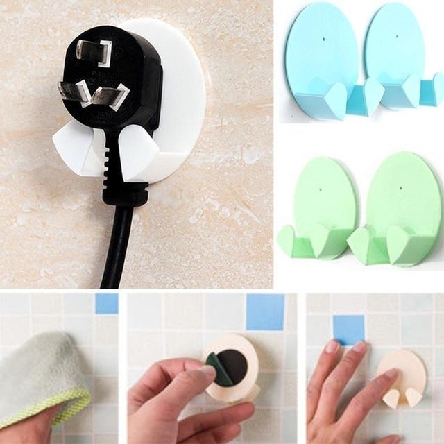 2pcs/Pack Random Color Home Office Wall Adhesive Plastic Power Plug Socket Holder Hanger Wall Storag LS