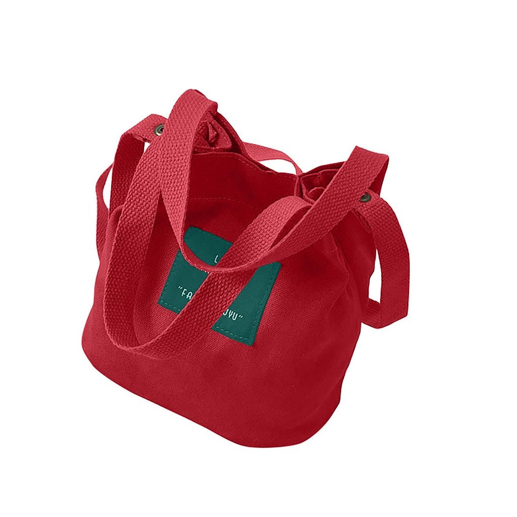 Borsa a secchiello in tela con tracolla, chiusura a coulisse e manici superiori per l'uso quotidiano e i viaggi
