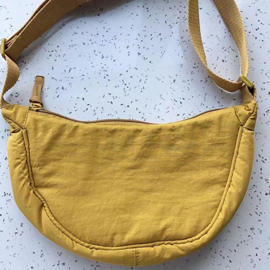 Summer 2025 Women's Waterproof Nylon Crossbody Bag - Solid Color Dumpling Style