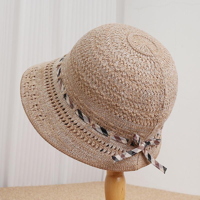 French elegant woven bucket hat women's spring and summer thin hollow breathable sunscreen visor showing face small holiday basin hat