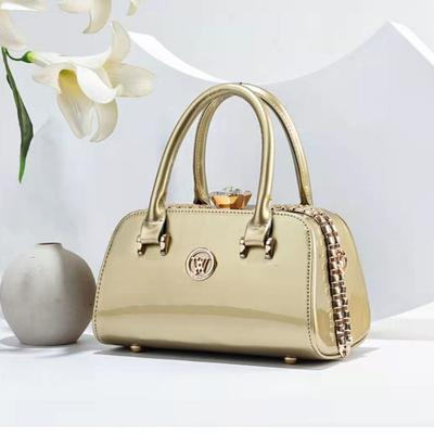 Luxusmarken-Designer Damenhandtasche Hochwertige Einzelschultertasche Stahlrahmen Leder Umhängetasche Klassische Retro Tragetasche