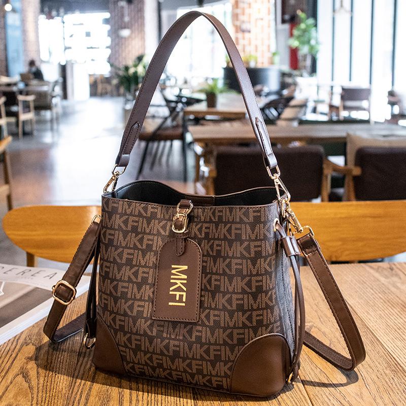 

Women s bag spring and summer new fashion trend bucket bag high-end sense portable shoulder messenger bag