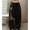 Lässige Sporthose mit Aufdruck eines Spinnen- und Spinnennetz-MusterElements, Gerade geschnittene Hose für Damen im amerikanischen Trend