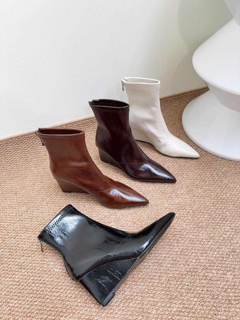 Innvendig forhøyende Martin-støvletter dame 2025 ny høst- og vintertemperament tynn spiss kilehæl høy hæl korte støvletter bakre glidelåsstøvletter