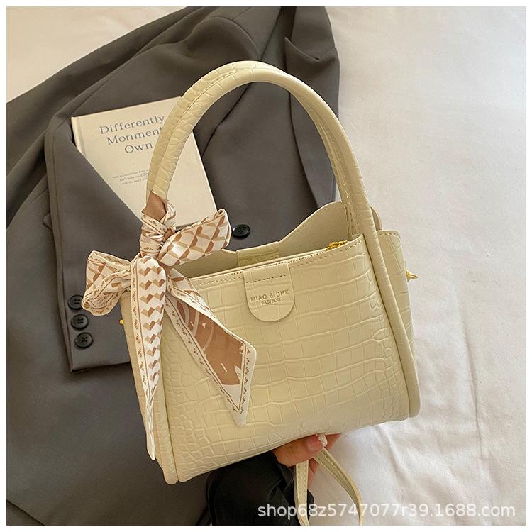 

Retro vegetable basket handbag women s 2025 new high-end portable bucket bag simple shoulder messenger bag