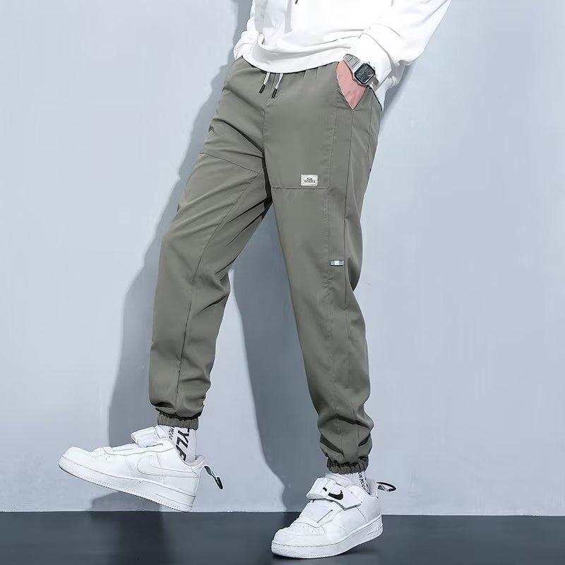 Men's casual pants summer loose new Harlan tied feet trend ice elastic overalls